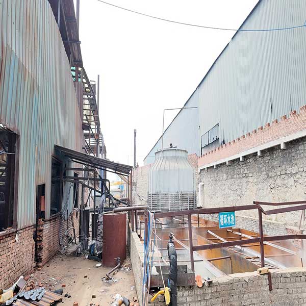 Industrial cooling tower and circulating water pool at a caustic soda liquid chemical plant