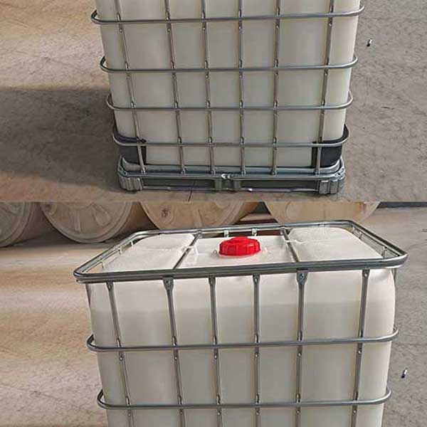 Bulk IBC tote container with caustic soda in liquid soap production stored in warehouse