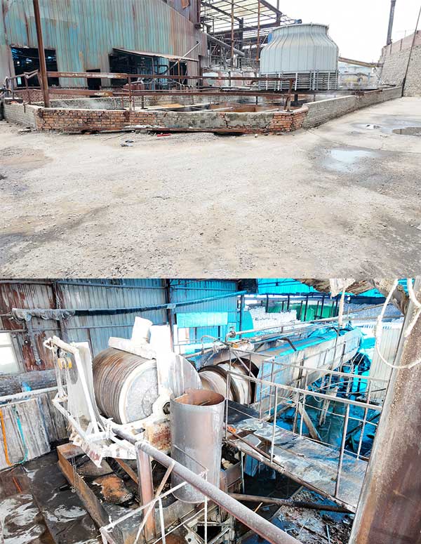 Caustic soda flaking machinery inside chemical plant manufacturing sodium hydroxide for soap making.