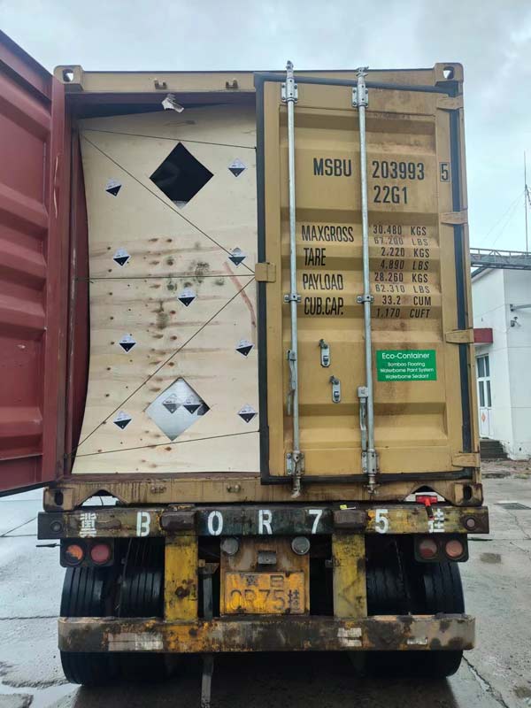 Rear door perspective of a container loaded with bagged caustic soda pearls ready for competitive global market shipping