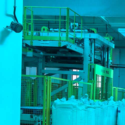 Heavy duty chemical processing plant displaying automated machinery for manufacturing sodium hydroxide chemical