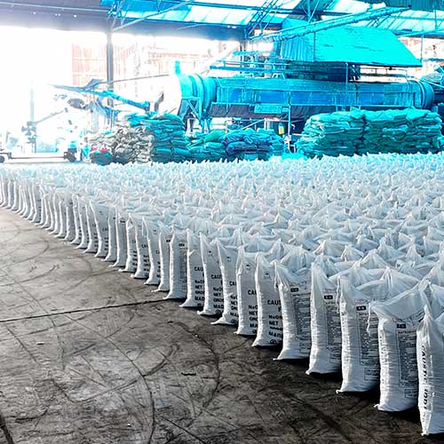 Sodium hydroxide and sodium hypochlorite bags stacked in industrial manufacturing plant