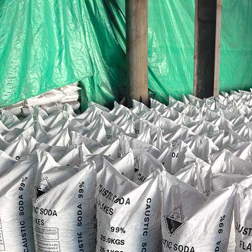 Factory inventory of sodium caustic product bags, providing reliable raw materials for soap and detergent manufacturing.