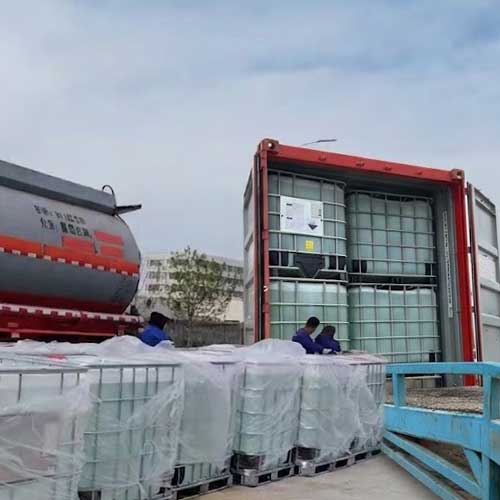 Bulk packaging solution for sodium hydroxide 32%, featuring reinforced IBC totes wrapped for extra protection during transit.