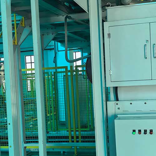 Industrial environment view showing structural supports and automated feed systems for caustic soda in soap making