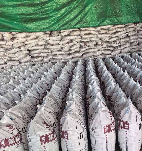 industrial warehouse storing thousands of caustic soda bag units for bulk export