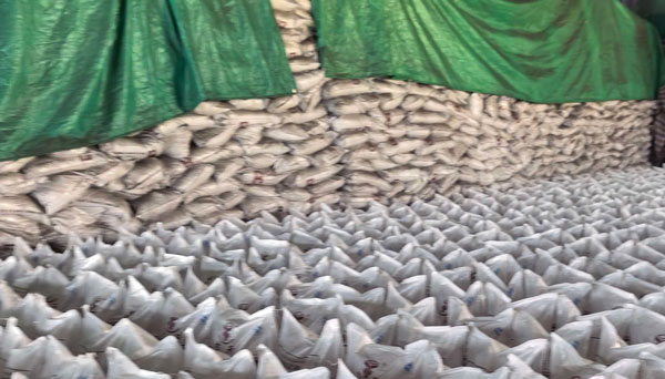 caustic soda parels manufacturer inventory stacked in industrial logistics depot