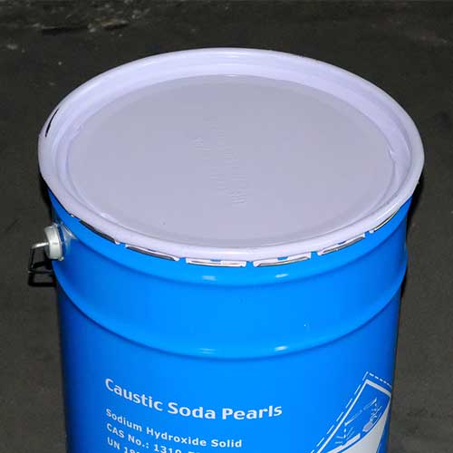 Blue 25kg steel drum clearly printed with Caustic Soda Pearls and Class 8 hazardous marks, containing pure sodium hydroxide prills.