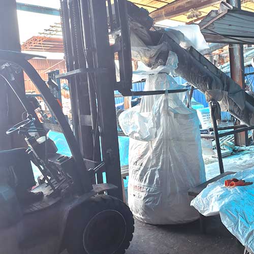 Industrial transfer tubes and packaging equipment maintained inside a 50 caustic solution facility.