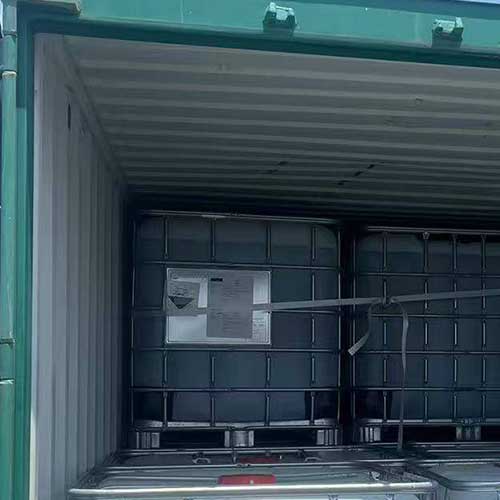 Export-grade chemical containers loaded with caustic soda 30 for global distribution.