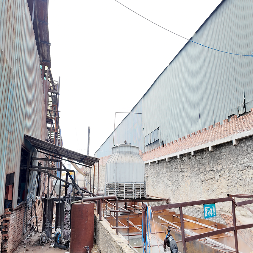 Industrial cooling tower and circulating water pool used in caustic soda liquid 48 production.