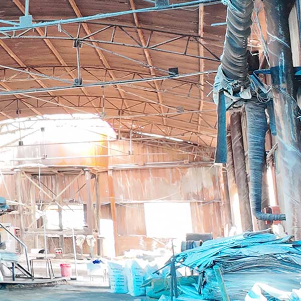 Large-scale factory production line maintained by wholesale caustic soda lye suppliers.